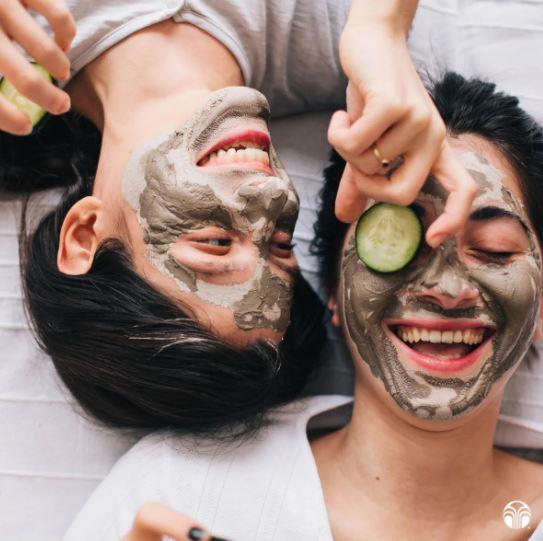 Happy couple with Epoch Glacial Marine Mud Mud mask in gesict